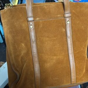 Women’s brown fossil